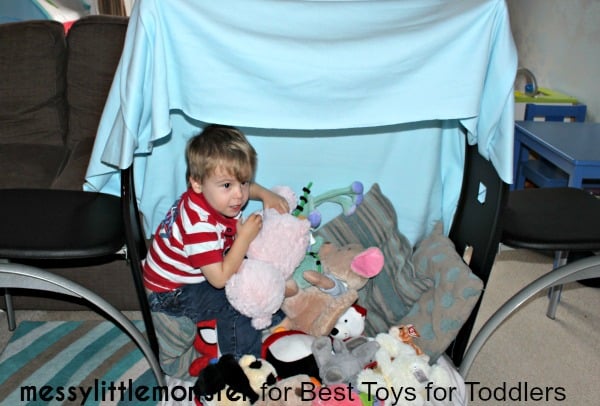7 Ways to Play with a Blanket - make  simple blanket den