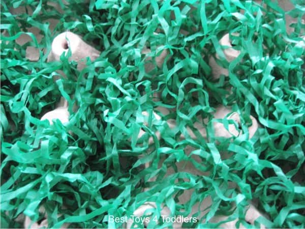 Use artificial grass and egg carton for planting pretend play