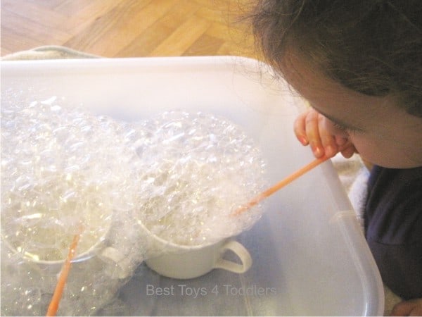 Making bubbles inside as a part of a sensory play
