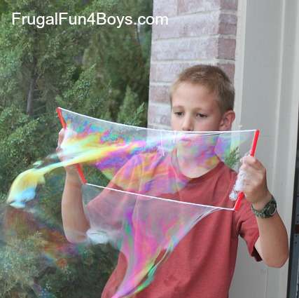 33 Out of the Box Activities with Drinking Straws - blowing giant bubbles