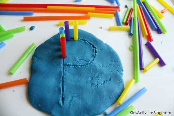 33 Out of the Box Activities with Drinking Straws - playdough pre-writing activity for toddlers