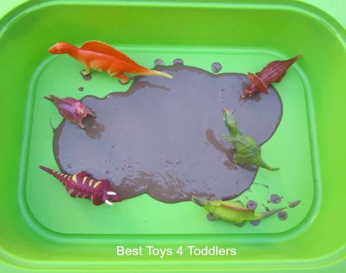 dinosaur mud sensory bin for toddlers